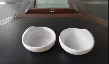 Two Palada bowls side by side showcasing the elegant white ceramic design