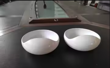Two Palada bowls showcasing the curved interior design and spill-proof ridge feature